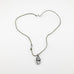 Birds of the Air Oval Gray Necklace