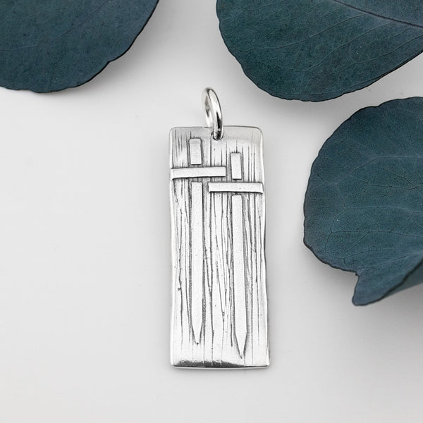 Iron Sharpens Iron Pendant - Holly Lane