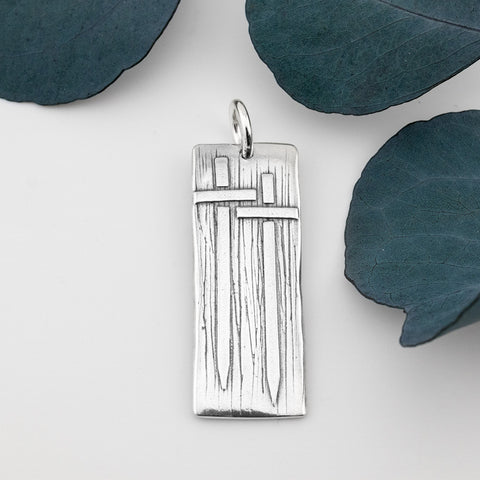 Iron Sharpens Iron Pendant - Holly Lane