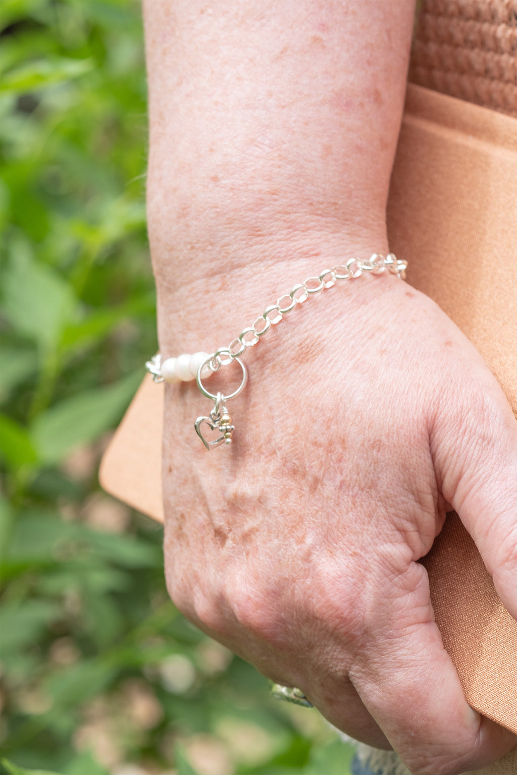 Dainty Pearl Cross Charm Bracelet: Elegant White Pearls -  in